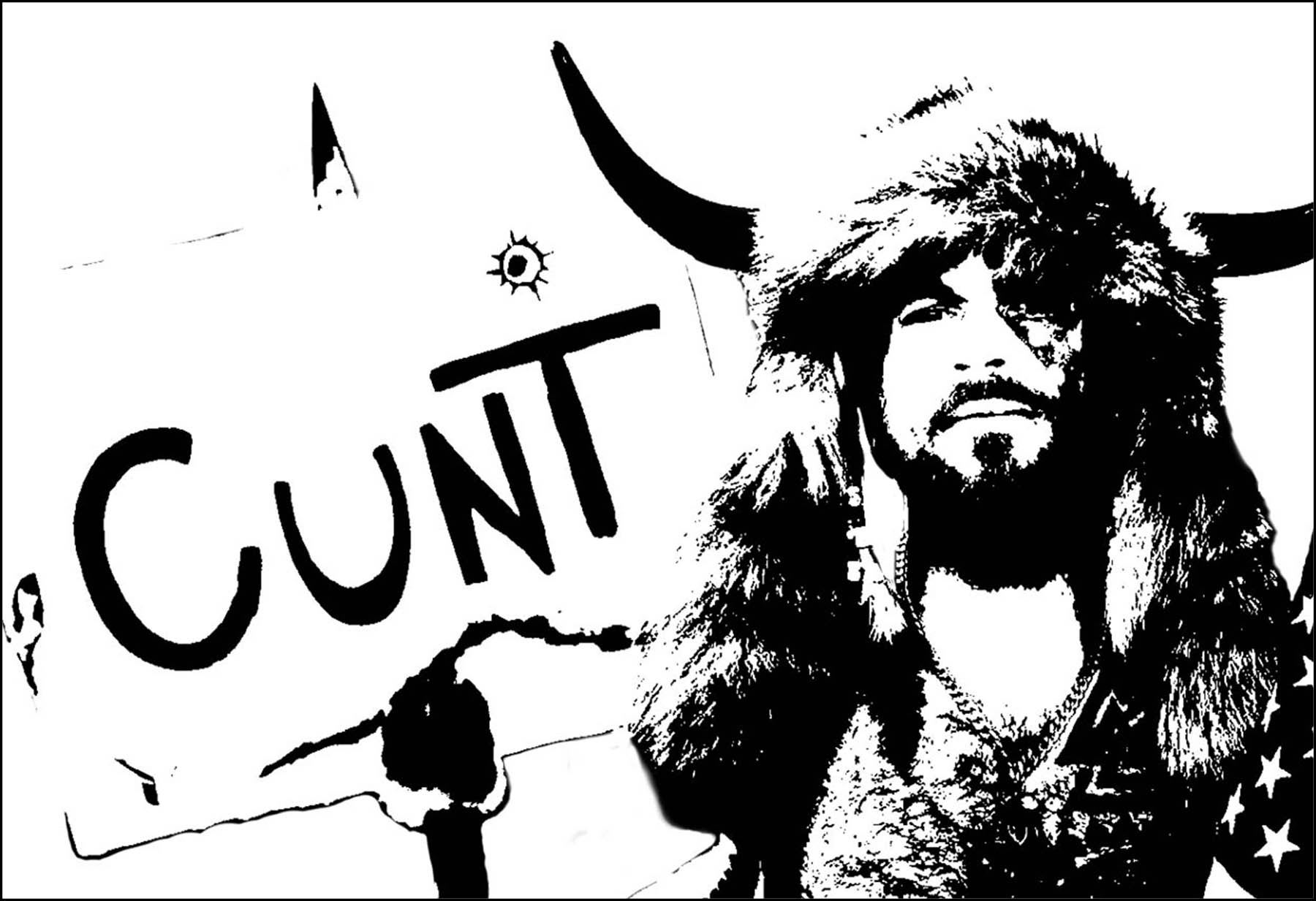 Capitol siege protester draped in fur and animal horns holding a cunt placard