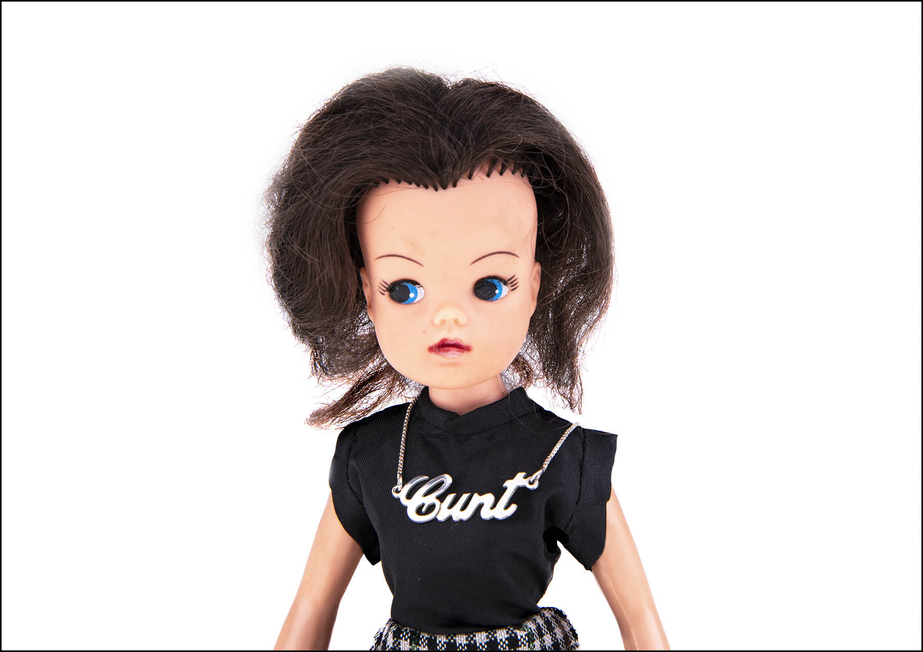 Sindy Doll wearing cunt necklace